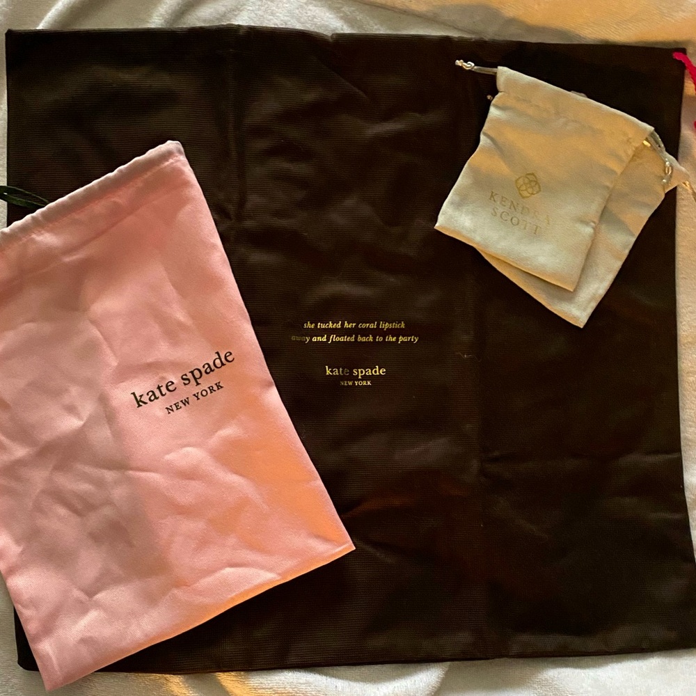 Dust covers for purses and jewelry. Two Kate spade. Two Kendra Scott